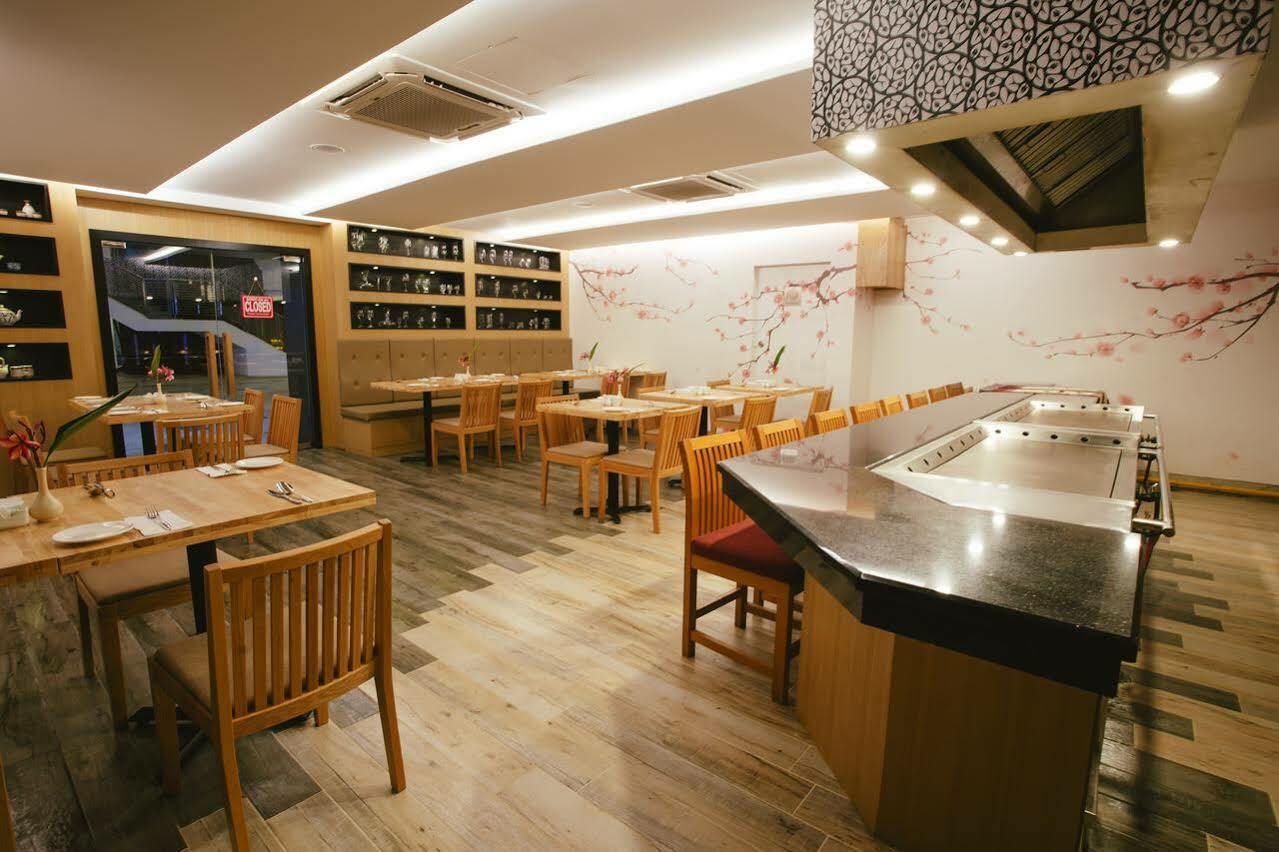 منتجع وسبا ساند آند ساندلز ديزارو بيتش دِسارو المظهر الخارجي الصورة Interior of a restaurant in Hong Kong